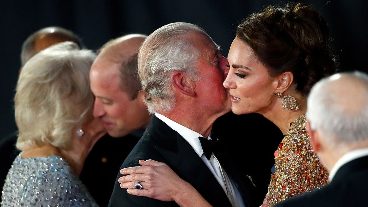 Camilla, Prince William, Prince Charles and Catherine arrive at the Royal Albert Hall premiere.