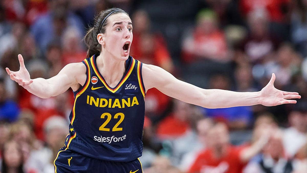 A photo of Caitlin Clark on the court during a WNBA game.