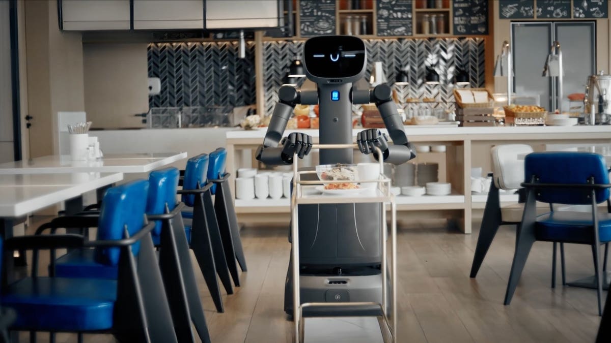 A robot pushing a cart