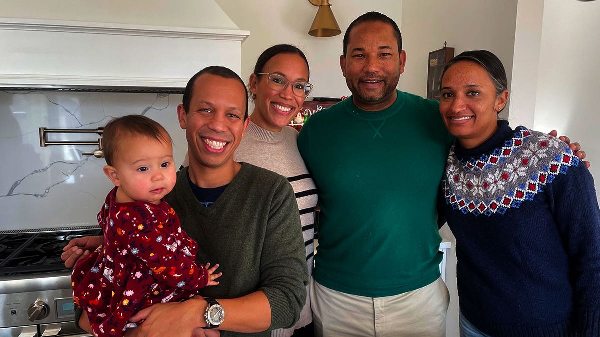 NASA astronaut Chris Williams with his sister and two of his cousins.