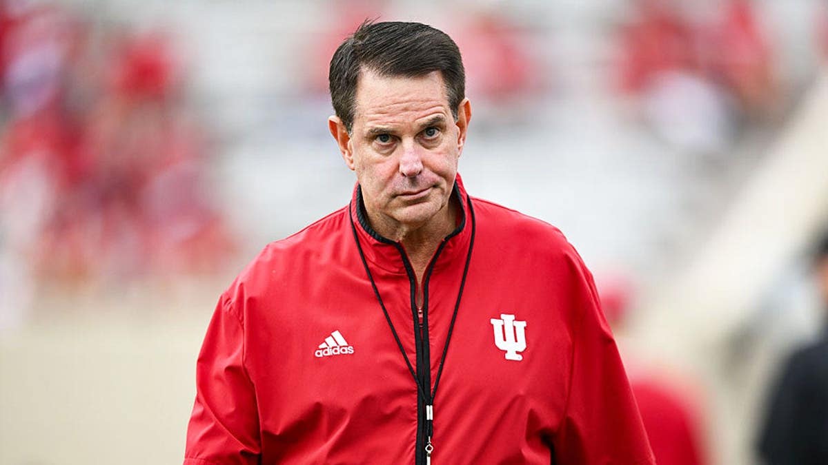 Curt Cignetti walks onto the field at Memorial Stadium.