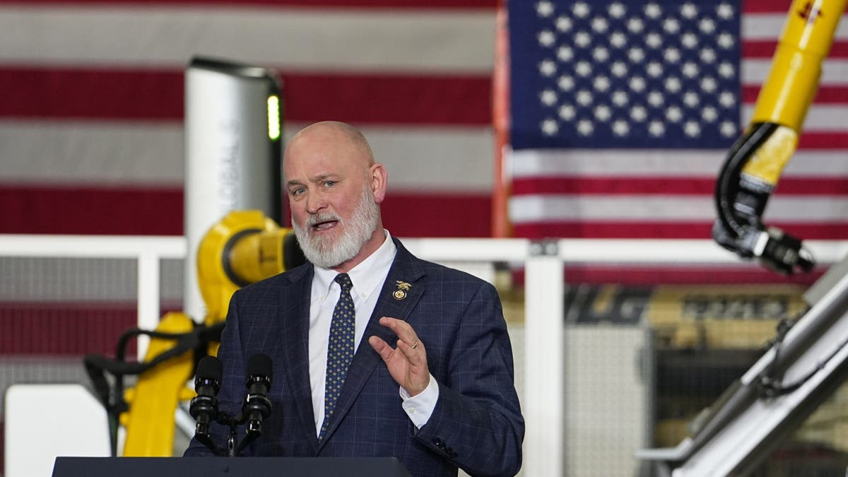 Representative Derrick Van Orden speaks before Vice President J.D. Vance at Pointe Precision in Plover, Wisconsin.