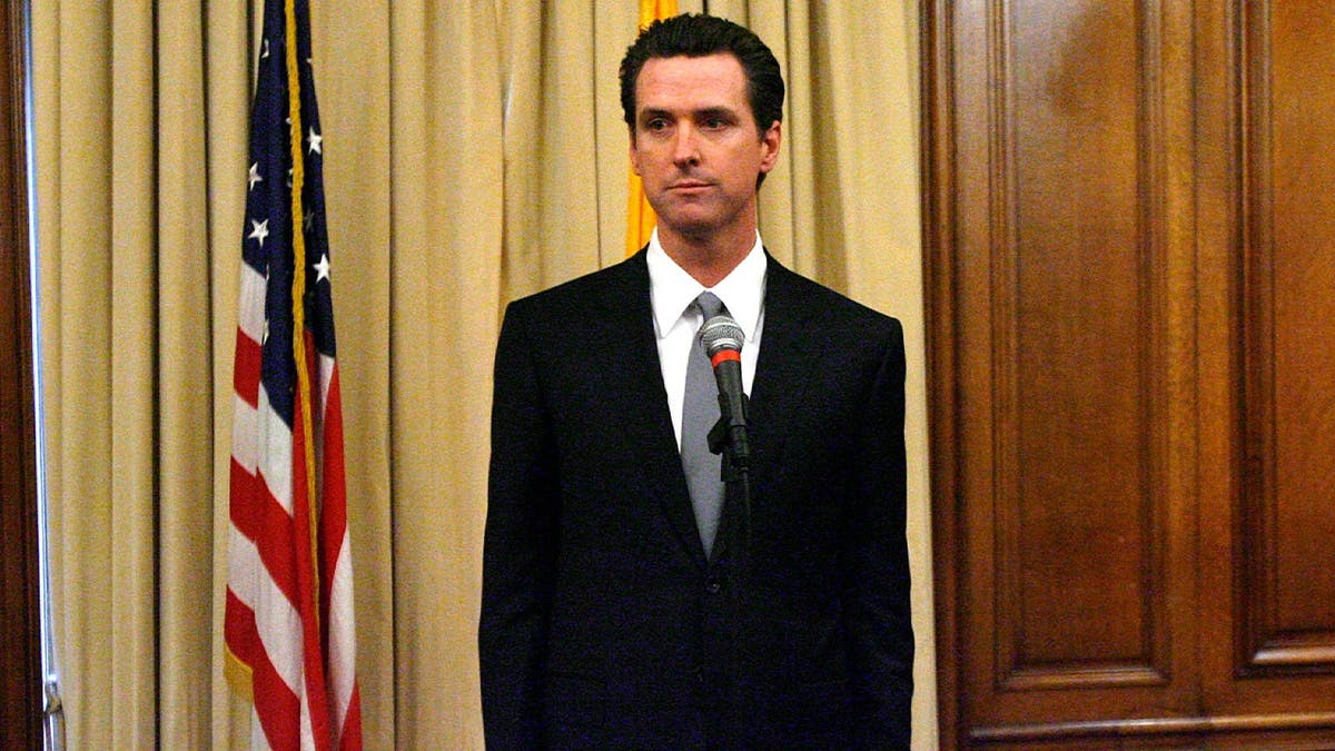 Gavin Newsom apologizes during San Francisco news conference.