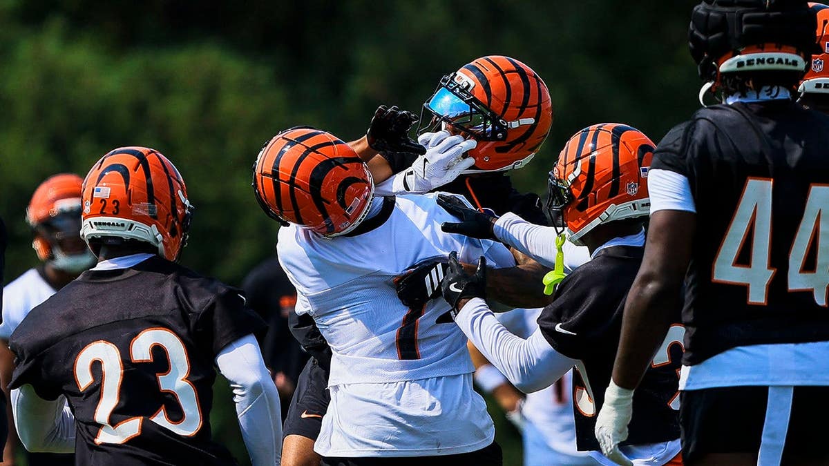 Ja'Marr Chase confronts DJ Turner II during Cincinnati Bengals training camp.