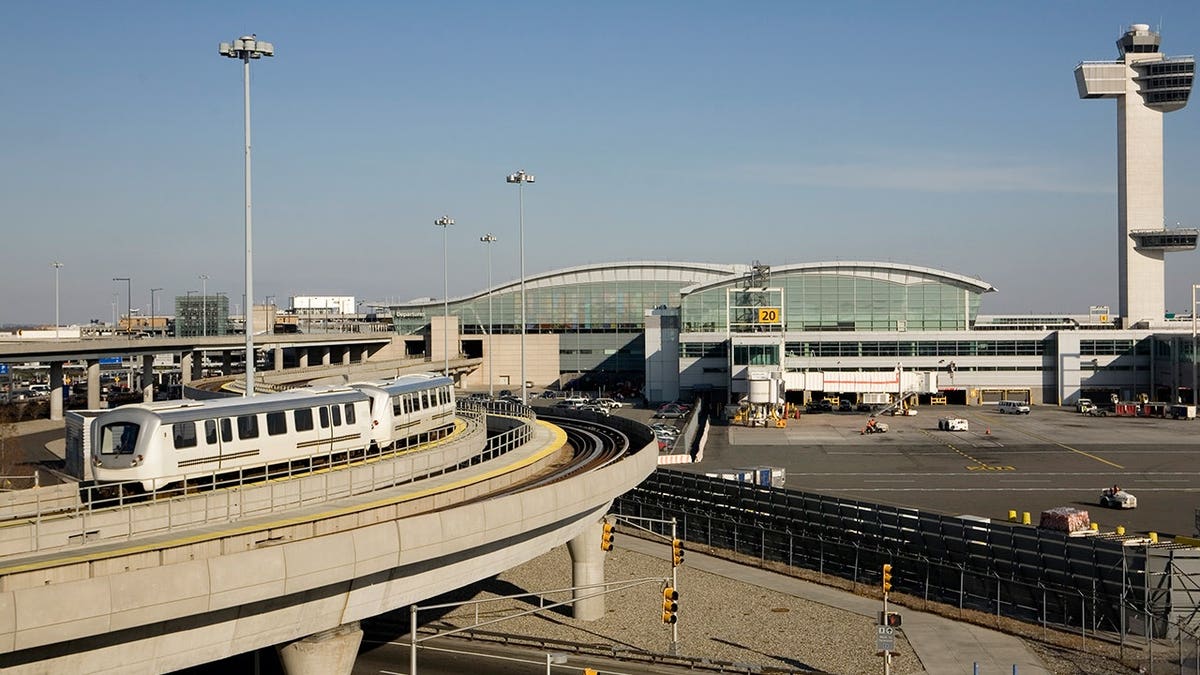 Control tower, terminal and train at Kennedy Airport in New York