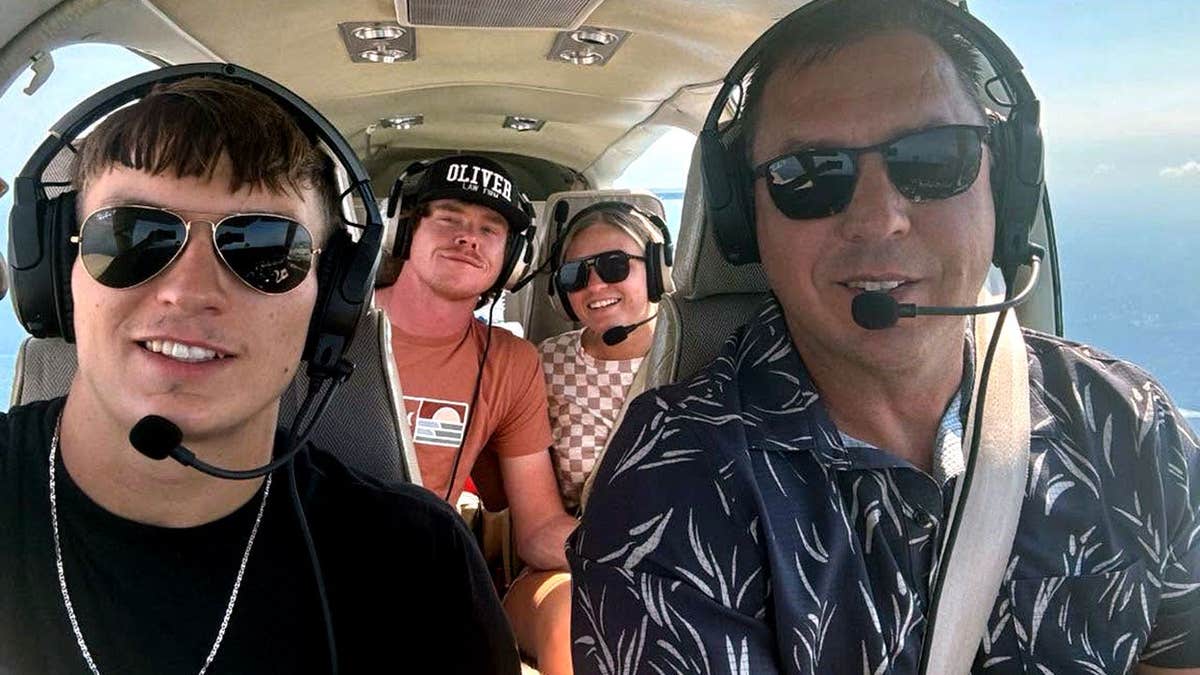 Jimmy Don Lewis and Brayden Ty Lewis in a small plane