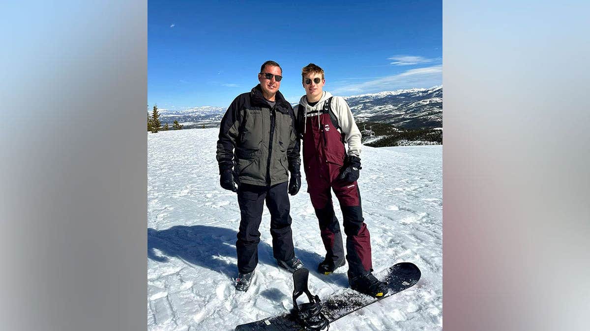 Jimmy Don Lewis and Brayden Ty Lewis on a snowy mountain