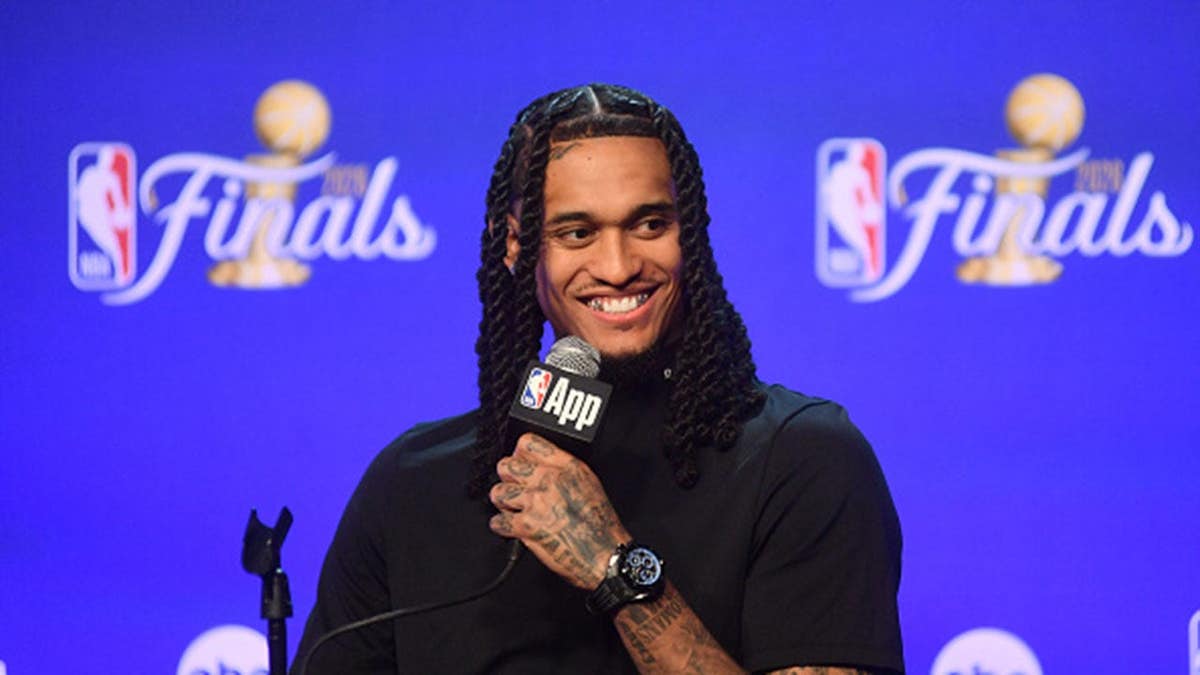 Jordan Clarkson speaks to reporters at a media availability.