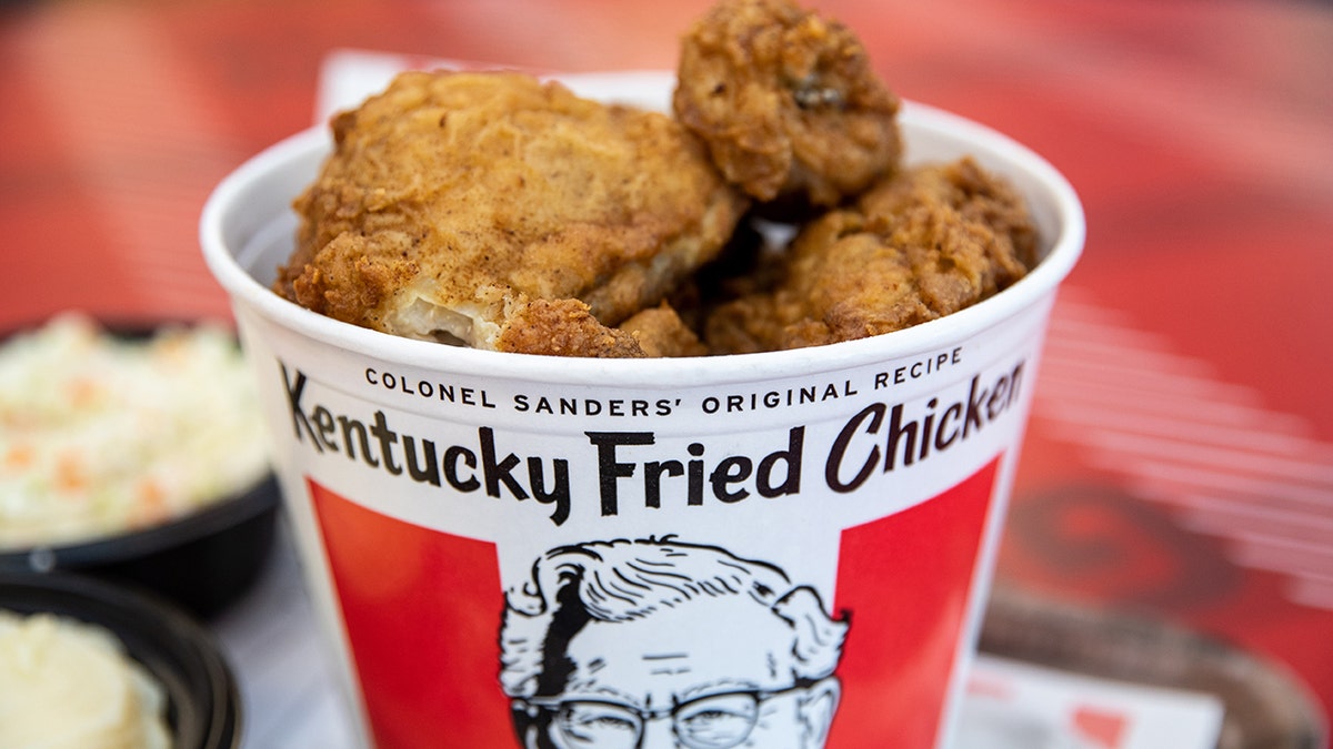 A Kentucky Fried Chicken bucket with the writing "Colonel Sanders' original recipe" on it.