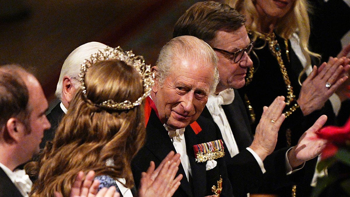 King Charles III, Germany's President Frank-Walter Steinmeier and Catherine, Princess of Wales at a state banquet.