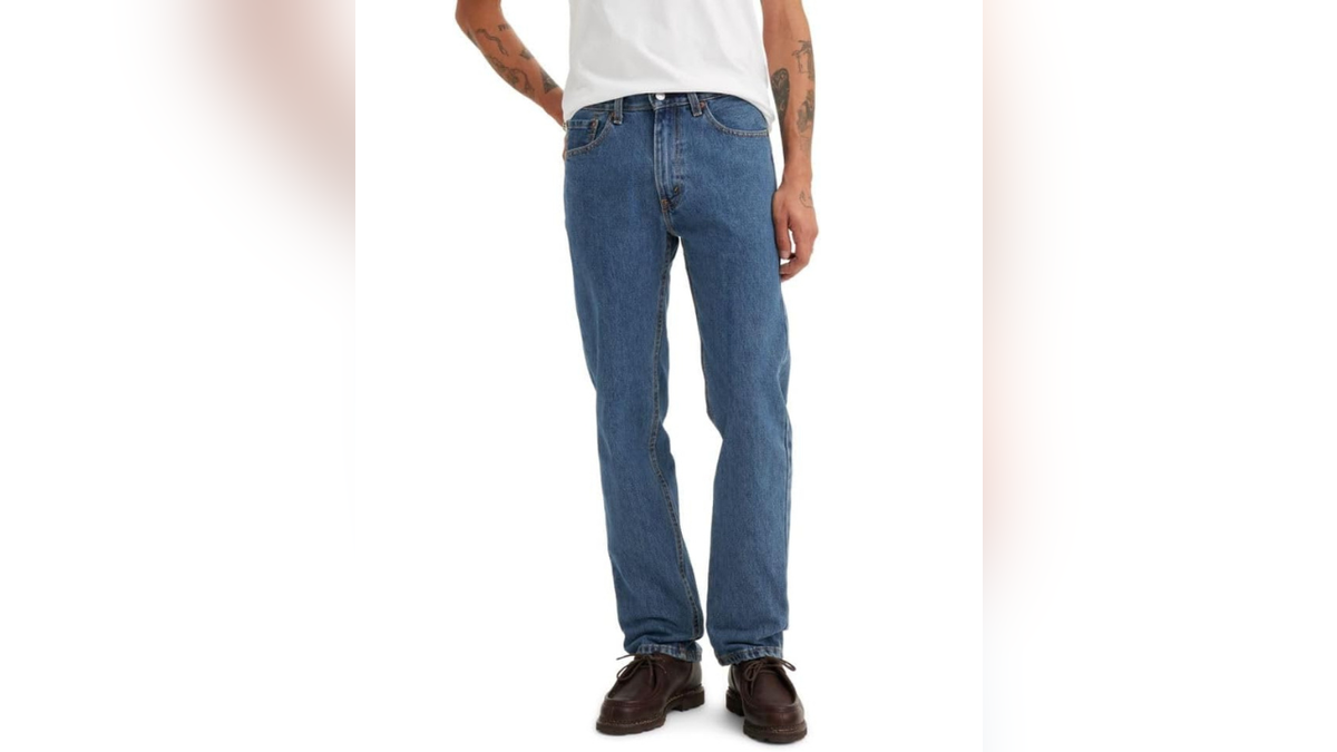 The 505 has a roomy, straight-leg silhouette with a classic zip fly.