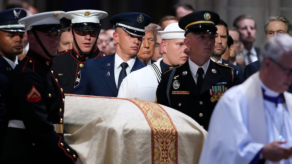 A military body bearer team carry the casket into to the funeral service for the late Sen. Lindsey Graham, R-S.C., at the Washington National Cathedral on July 28, 2026, in Washington, D.C.