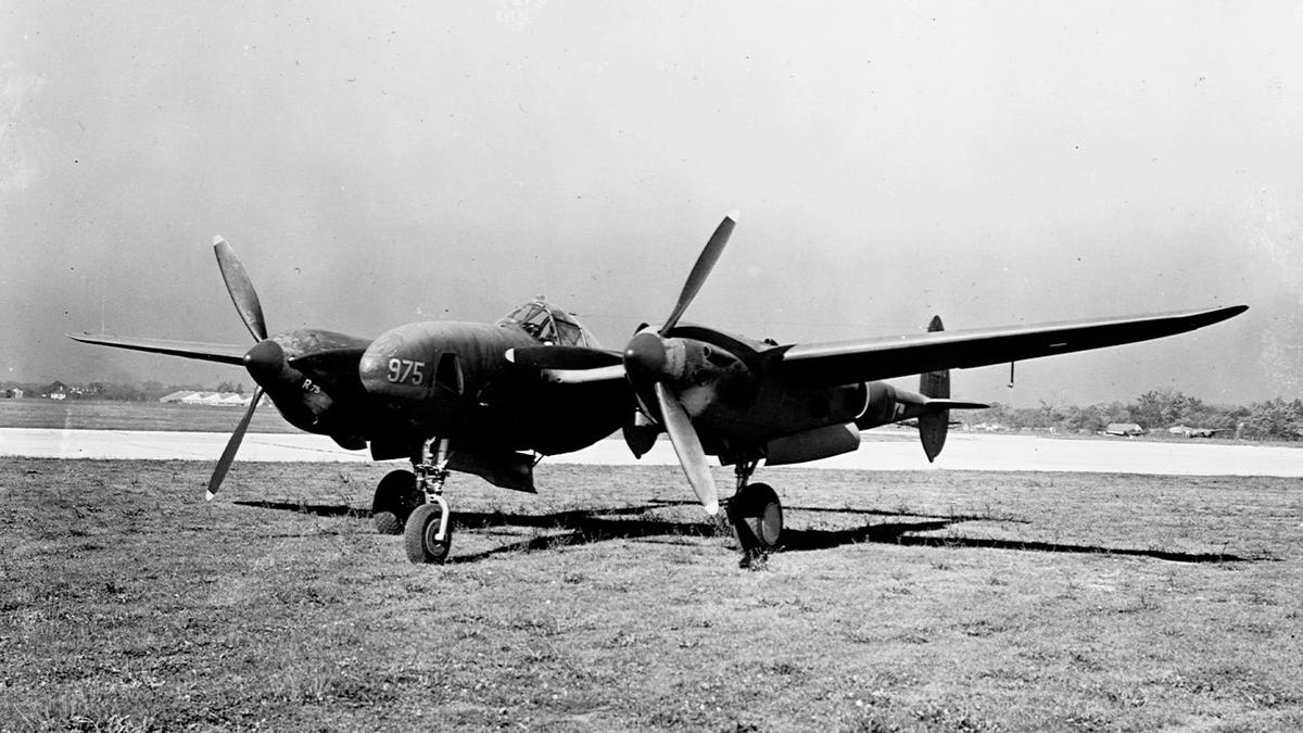 old WWII plane in black and white photo