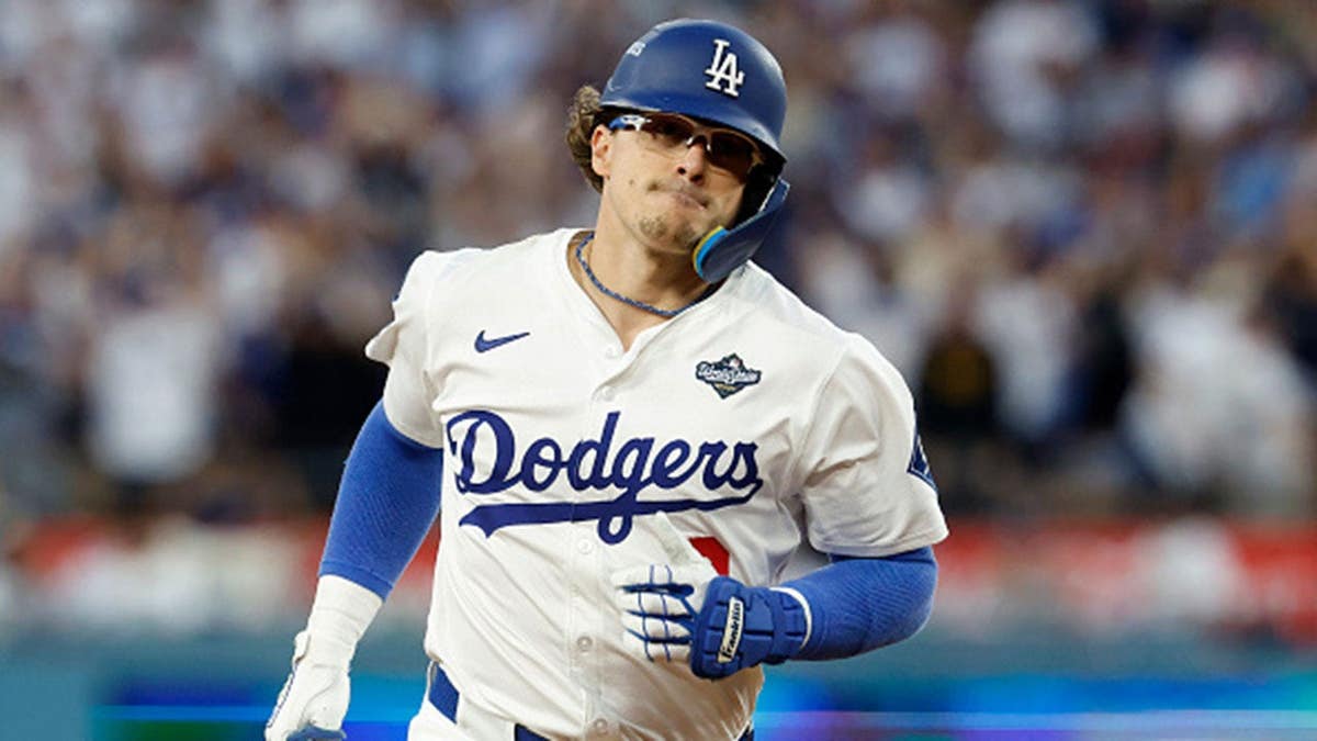 Enrique Hernandez rounds nan bases aft a location tally astatine Dodger Stadium.