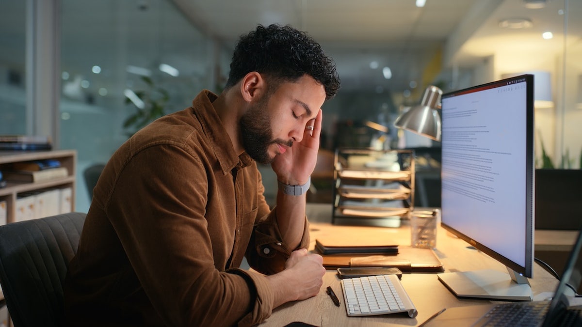 Man tired at work