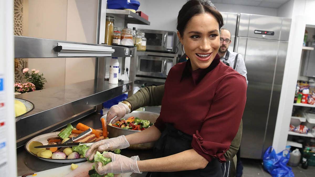 Meghan, Duchess of Sussex visits the Hubb Community Kitchen in London.