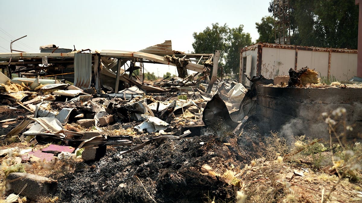 Damaged structures stand at the site of an airstrike in Mosul, Iraq.