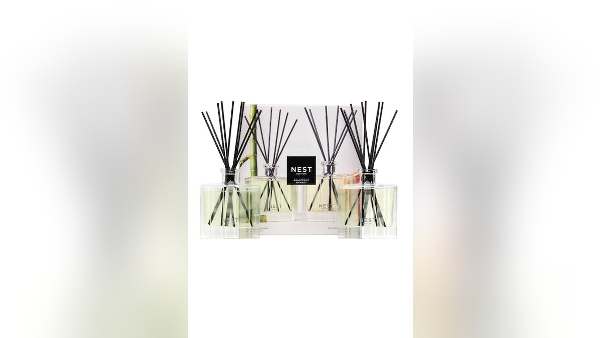 Freshen up any space with this set of NEST reed diffusers.