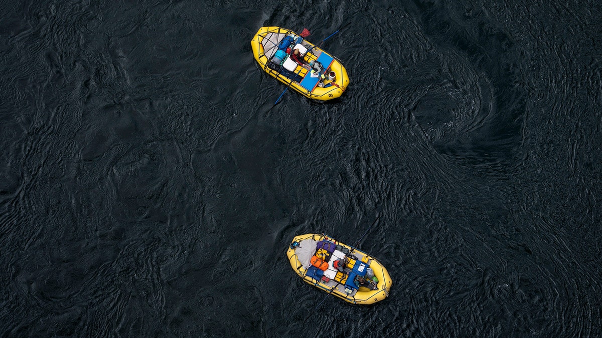 aerial view of two rafters on river