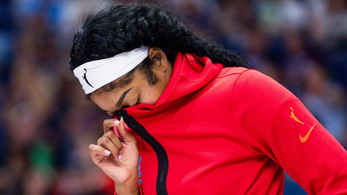 Angel Reese looks on during a WNBA game in Toronto.
