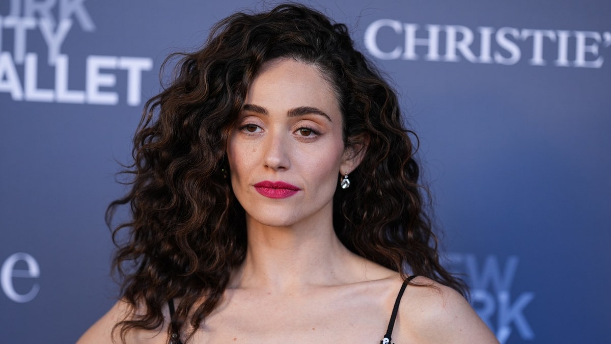 Emmy Rossum on a red carpet