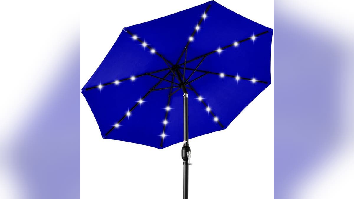 This umbrella illuminates your patio after sundown.