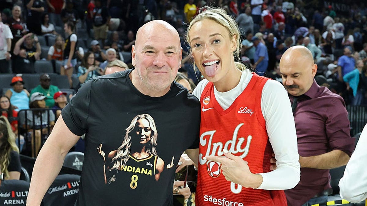 Dana White poses with Sophie Cunningham at the Michelob ULTRA Arena.