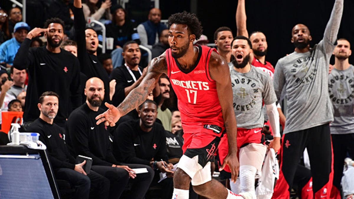 Tari Eason celebrates after making a three-point basket during a game in Detroit.