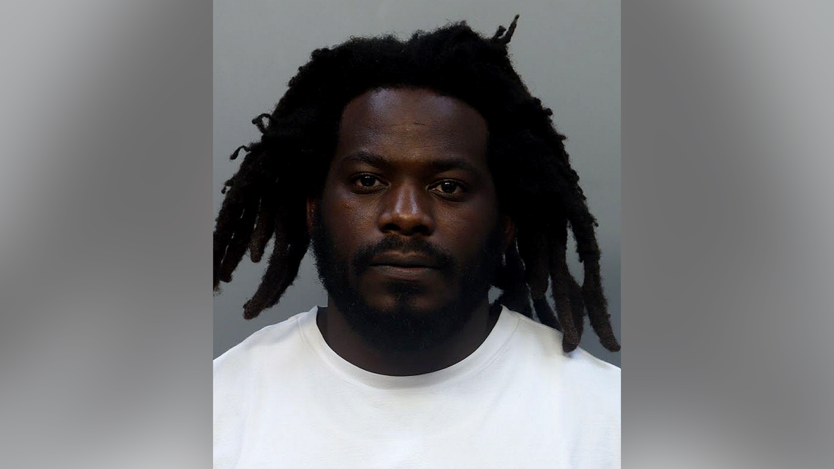 Mugshot of Terrod Torrence, a Miami coach charged pinch home violence