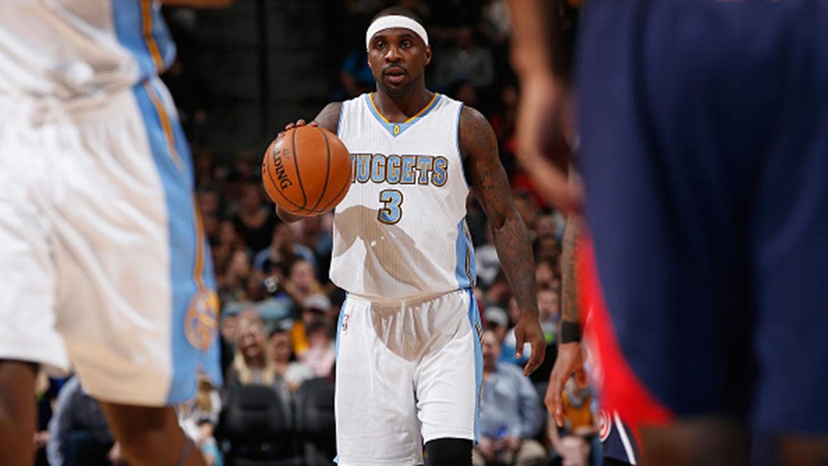Ty Lawson #3 controls the ball against the Atlanta Hawks at Pepsi Center.