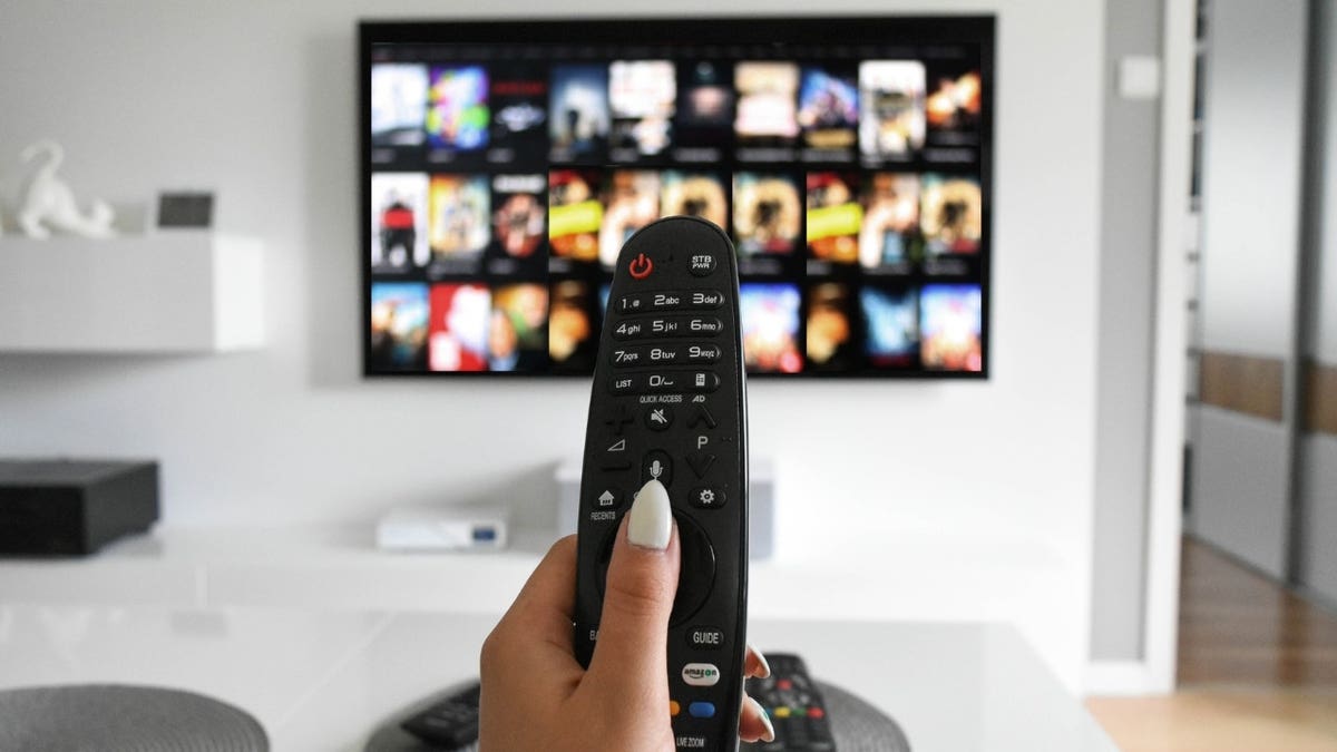 A person using a remote