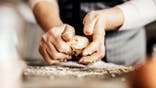 A person makes pastry.