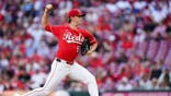 Brady Singer throws a pitch at Great American Ball Park.