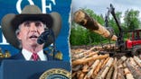 Burgum speaks in split image with logging scene