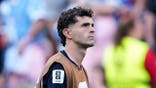 Christian Pulisic looks on