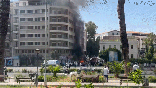 Moment of explosion in Damascus during Macron visit, smoke rises
