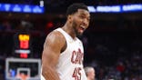Donovan Mitchell emotes on court