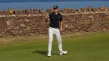 Ludvig Aberg waves to the crowd at the 2024 Genesis Scottish Open at The Renaissance Club in Scotland.