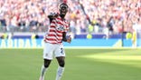 Team USA striker Folarin Balogun celebrates scoring a goal during the FIFA World Cup 2026 Round of 32 match against Bosnia and Herzegovina at Levi's Stadium in Santa Clara, California.