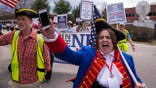 New Hampshire state Rep. Ellen Read speaks during a political demonstration in 2015. Read is fighting two speeding cases by arguing a provision of the New Hampshire Constitution protected her from arrest while traveling to or from legislative session.