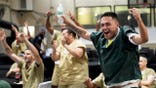 Rikers Island inmate Victor Caldas reacts during the World Cup semifinal soccer match