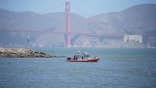 San Francisco Fire Department and Coast Guard crews search San Francisco Bay near Alcatraz after boat capsize
