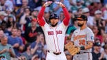 Wilyer Abreu celebrates after an RBI double during a game in Boston.