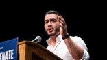 Michigan Democratic candidate for Senate Abdul El-Sayed speaks at The People V. The Powerful rally at the Detroit Opera House on July 18, 2026 in Detroit, Michigan.