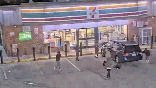 A man is attacked by several people outside a gas station.