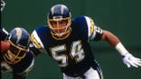 Billy Ray Smith No. 54 pursues the play during an NFL game at Jack Murphy Stadium.