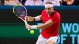 Rafael Nadal plays tennis.