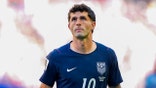 Christian Pulisic looks up on pitch