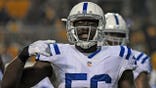 Daniel Adongo signals during an Indianapolis Colts game against the Pittsburgh Steelers.
