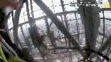 NYPD bodycam shows officers confronting an unharnessed couple atop a New York City skyscraper.